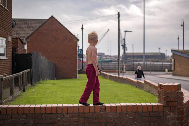 Child plays outside in Hartlepool, England, which has seen extreme social deprivation in recent years