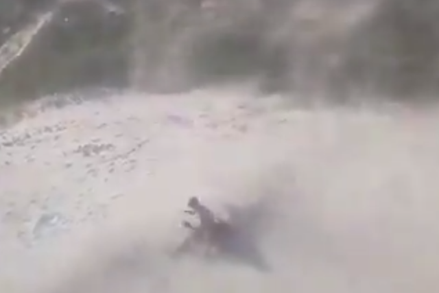 A police helicopter in the state of Santa Catarina creates a sandstorm to dispel sunbathers during a coronavirus lockdown.