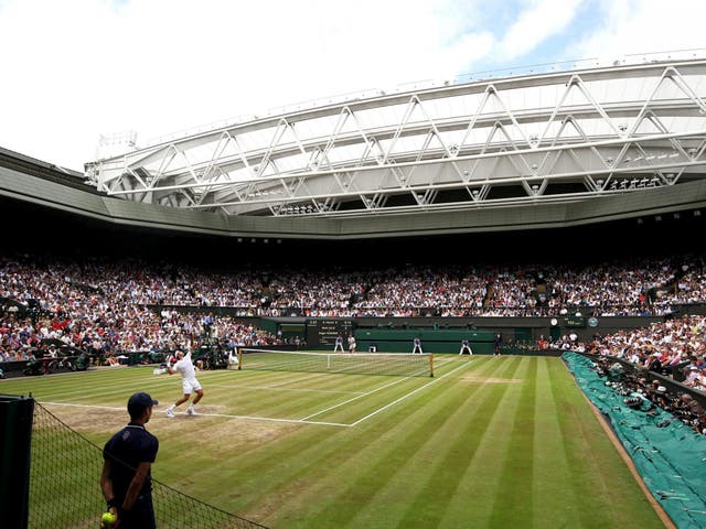 A general view of centre court as Roger Federer of Switzerland serves