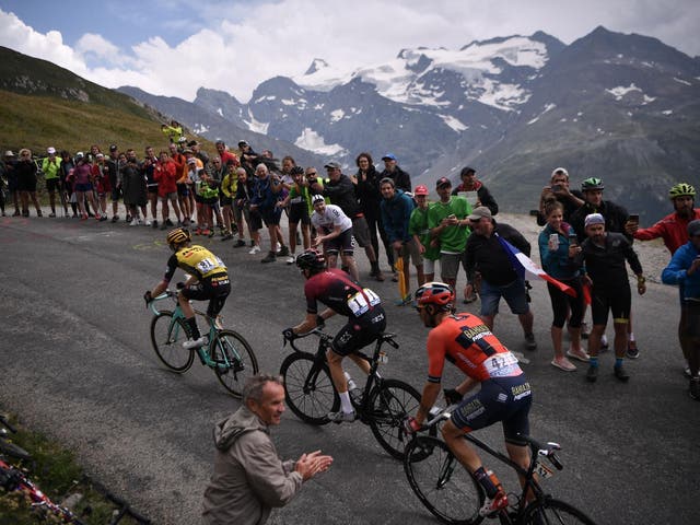 Fans cheer during the Tour de France