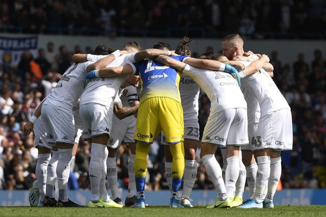 The Leeds United team in a huddle