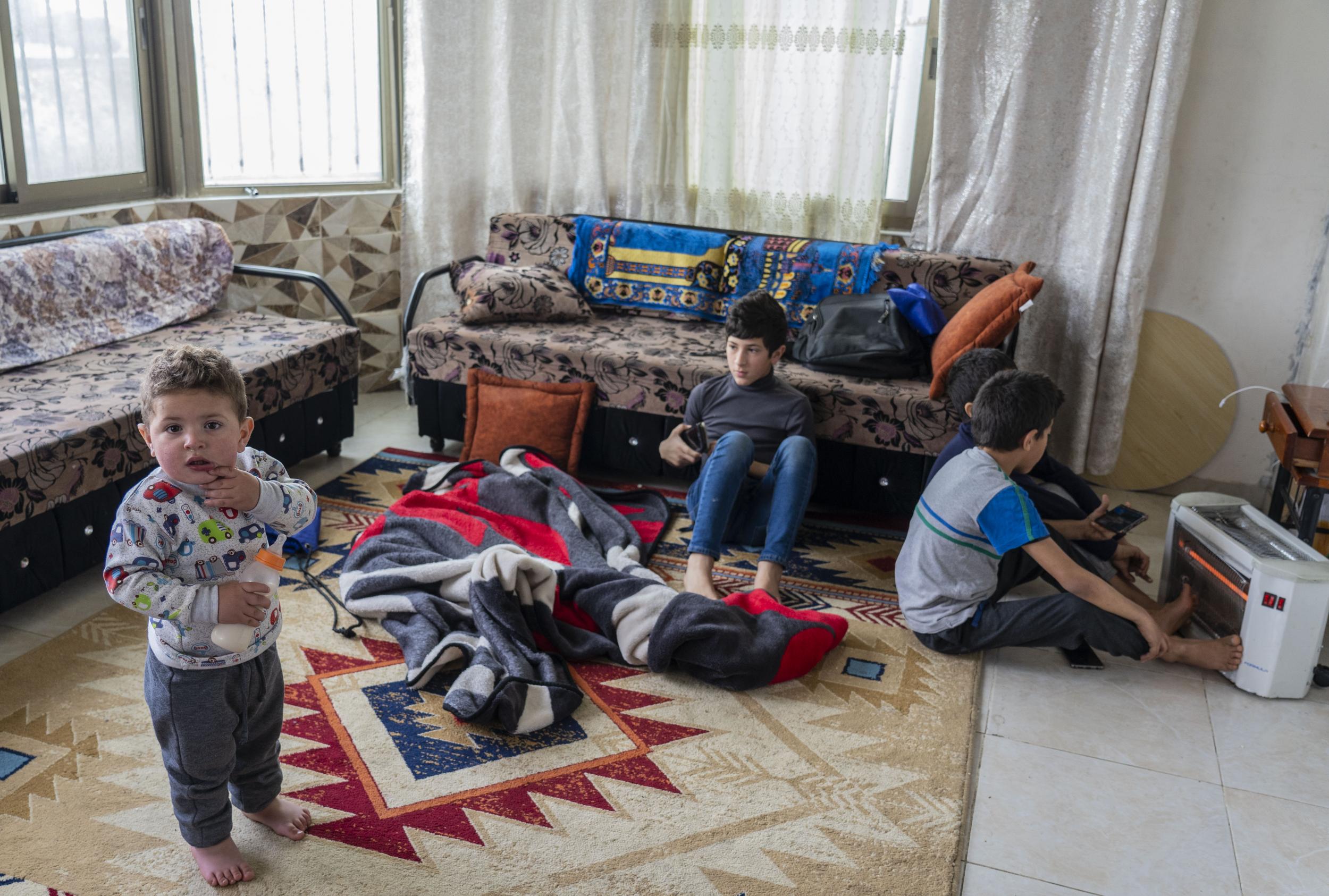 Moussa’s family in the only habitable room in the house. An Israeli demolition order destroyed their bedrooms