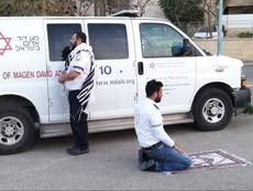 Coronavirus: Jewish and Muslim paramedics pray together in Israel