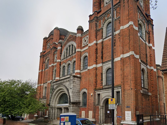 A woman's body has been found in the grounds of Memorial Community Church in east London