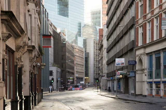 Streets in London’s usually bustling financial district remain empty