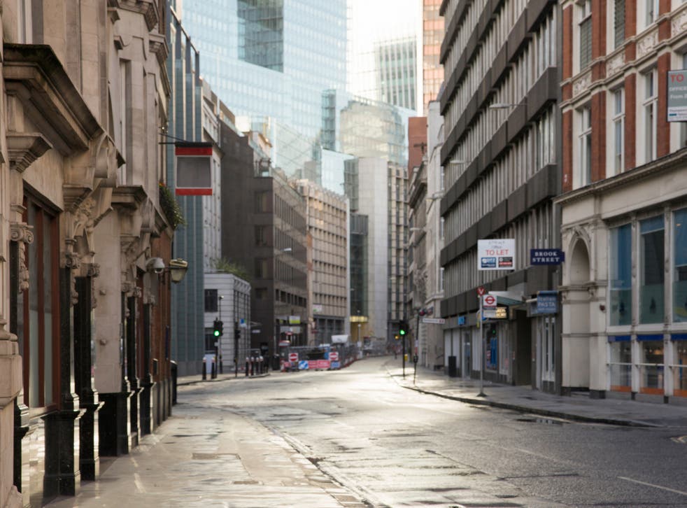 Streets in London’s usually bustling financial district remain empty