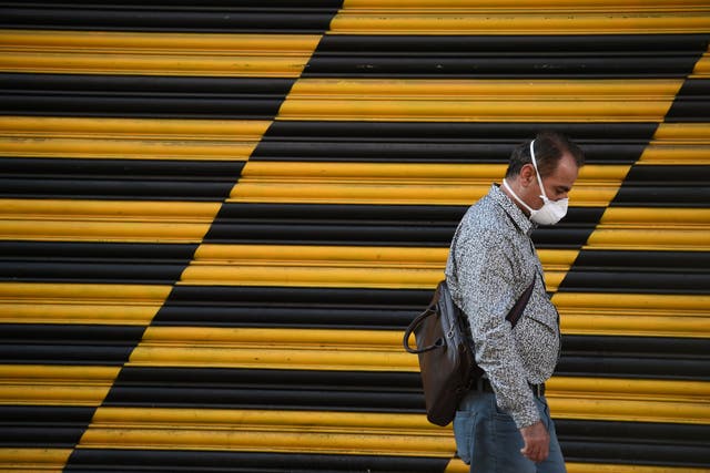 &#13;
The surge in demand for masks has led to shortages in some areas (AFP/Getty)&#13;