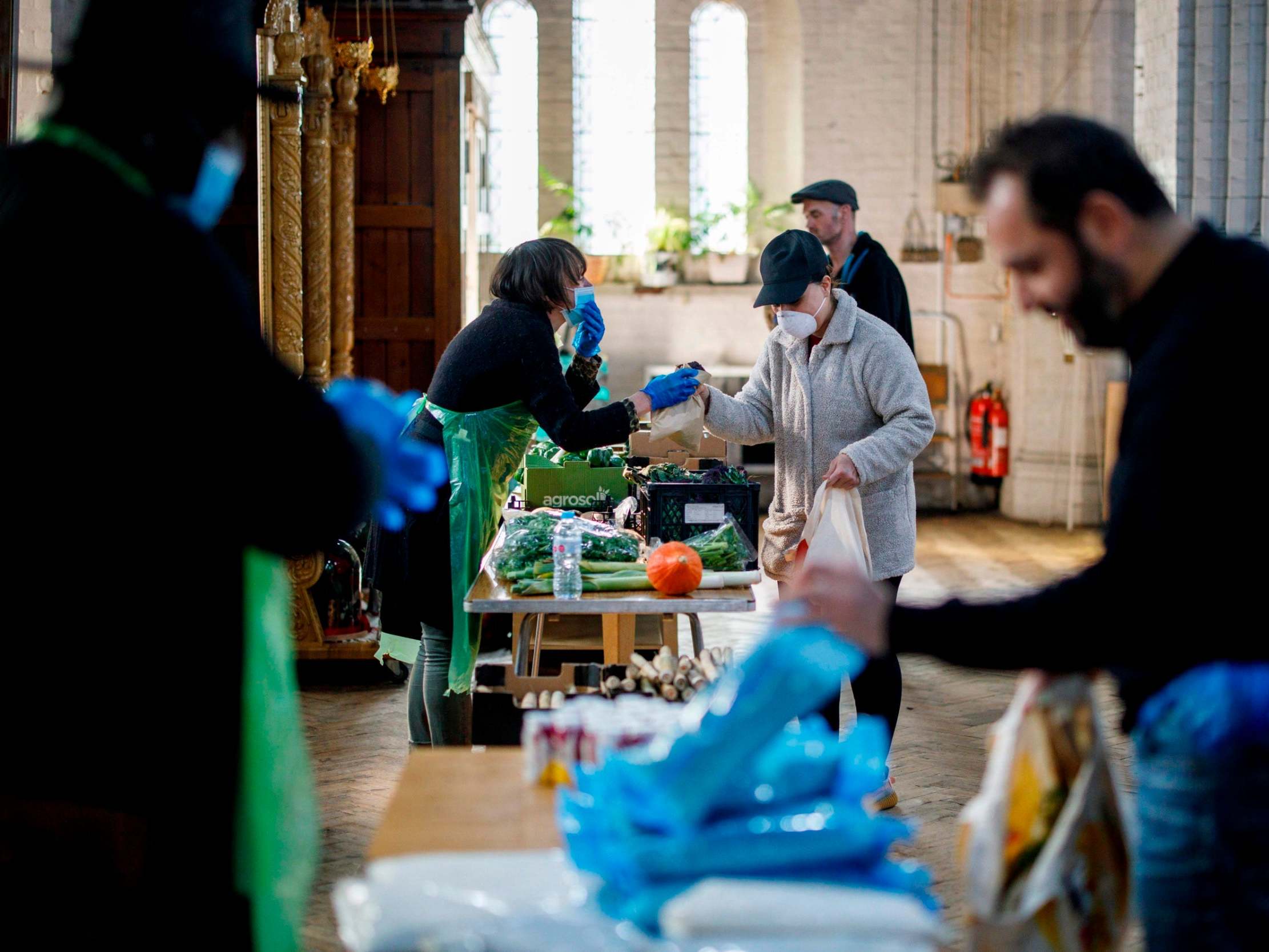 Volunteers hand out supplies at a centre in Leytonstone