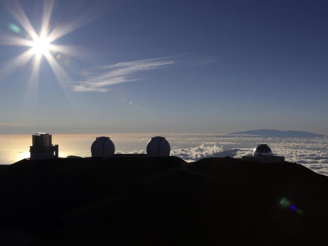 The sun sets at the summit of Mauna Kea