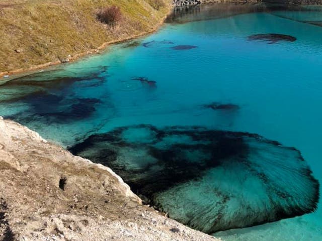 Derbyshire Police has dyed the Peak District's toxic "Blue Lagoon" black in a bid to deter people from gathering there during a government-imposed coronavirus lockdown.