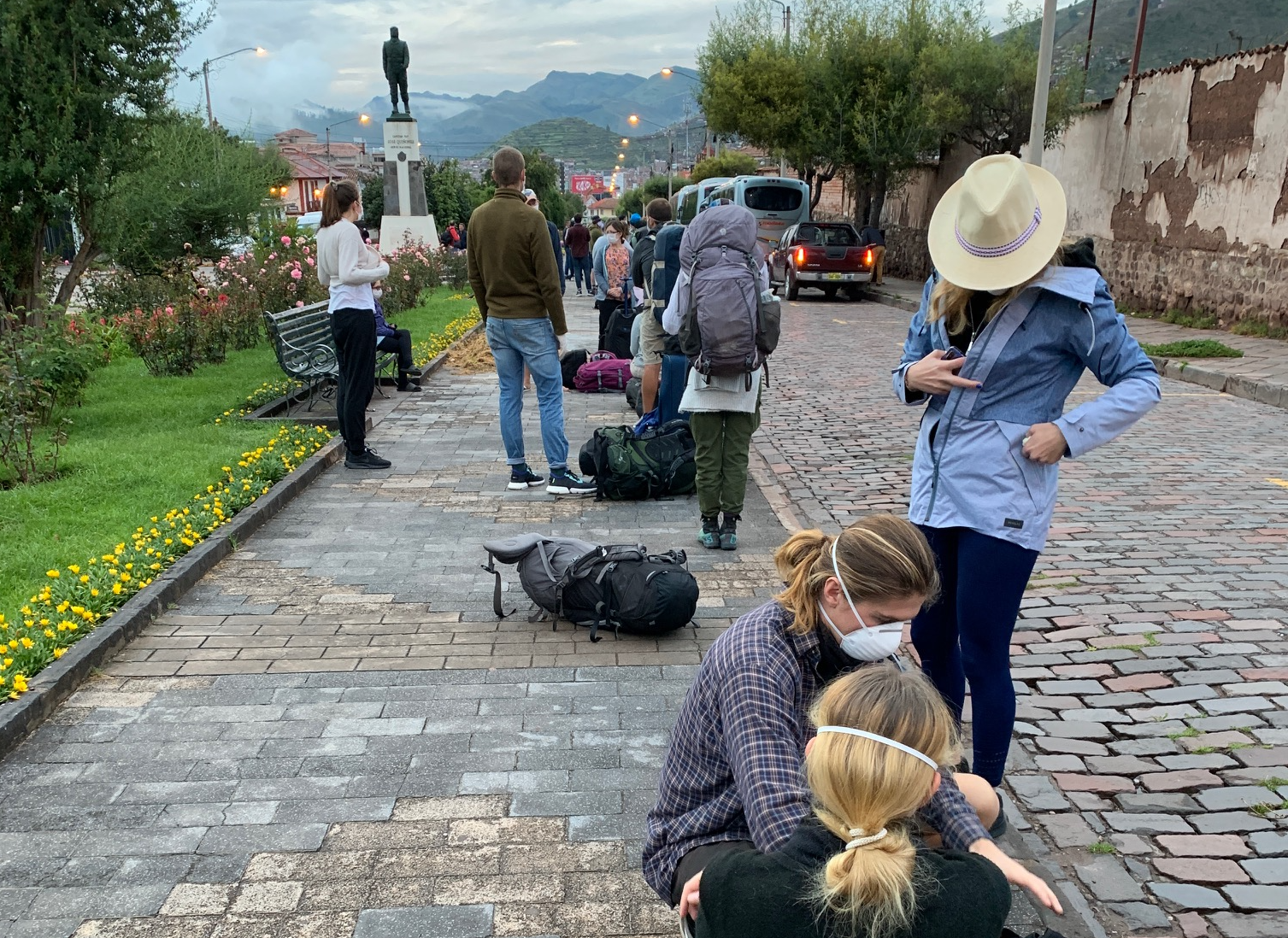 Homeward bound: British travellers wait for buses in Cusco to take them to the city’s airport for a flight to Lima and a connection to London