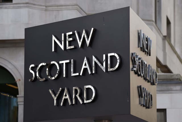 Scotland Yard said objects were thrown at police officers attending an unlicensed event in Notting Hill, London. 