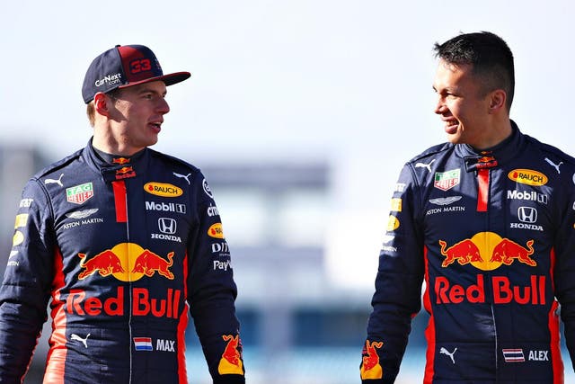 Red Bull Formula One drivers Max Verstappen (L) and Alexander Albon