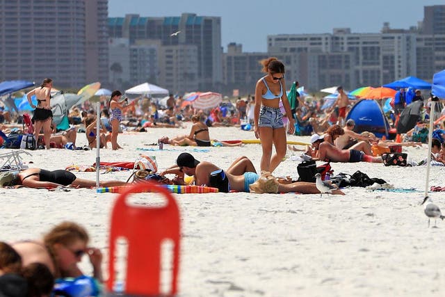 Related video: Footage from Florida's Clearwater Beach shows spring breakers gathering in large groups along the beaches