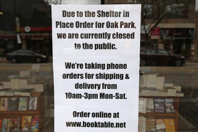 An independent bookstore in Oak Park, Illinois put up this sign as authorities in the state tried to stop the spread of the virus.