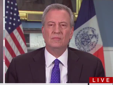 Bill de Blasio confronted for saying New Yorkers should 'go on about their lives' amid lockdown