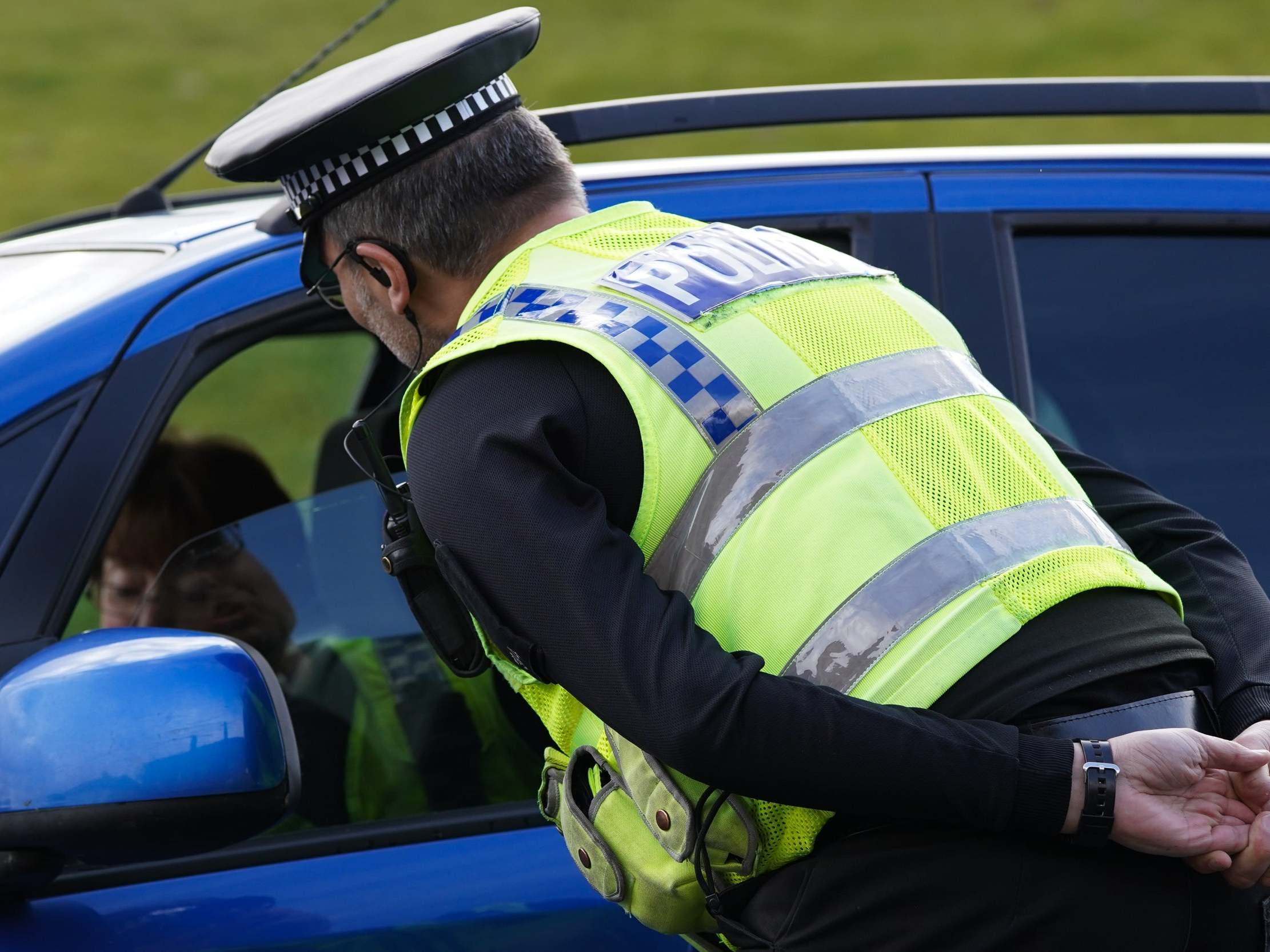 A North Yorkshire Police officer reinforces the importance of social distancing and staying at home at a vehicle stop