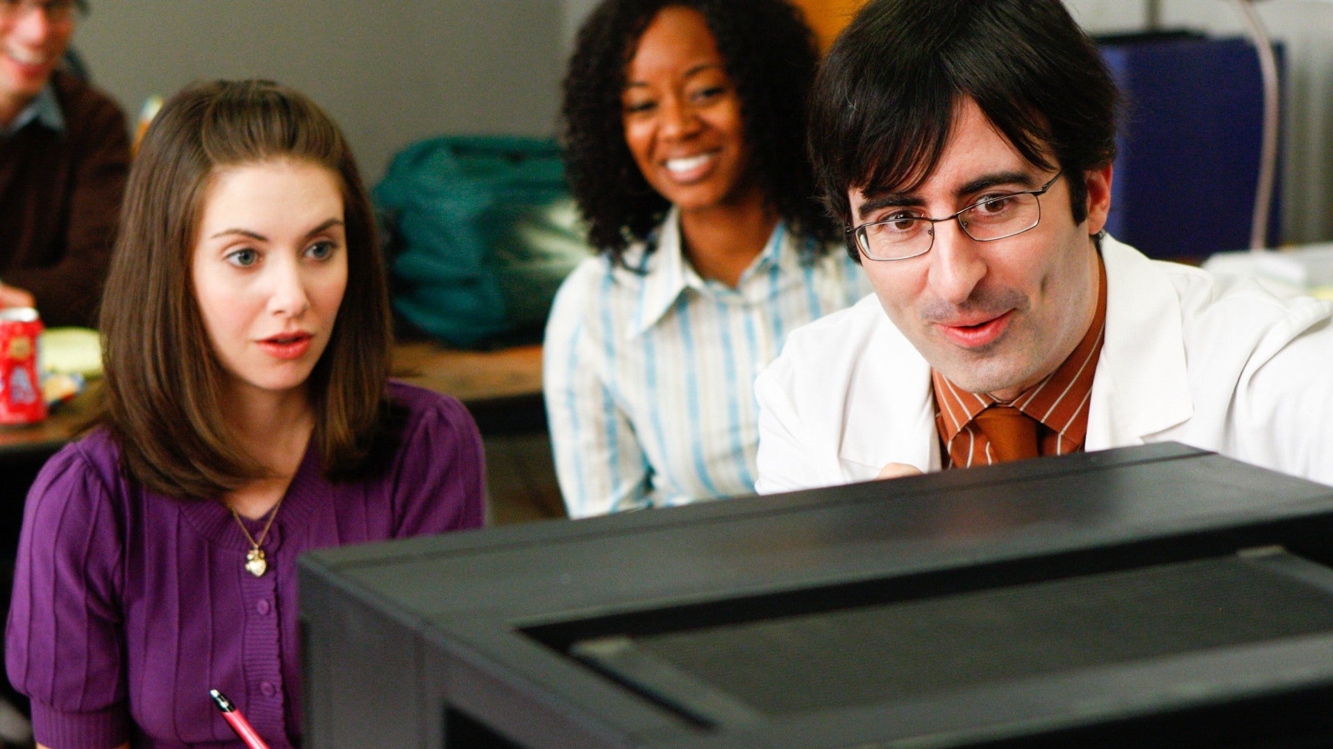 Alison Brie and John Oliver in Community