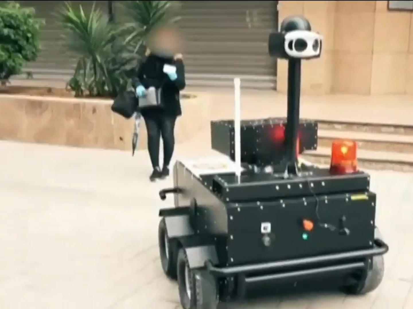 Coronavirus: Tunisia uses robots to police lockdown and tell people to stay home