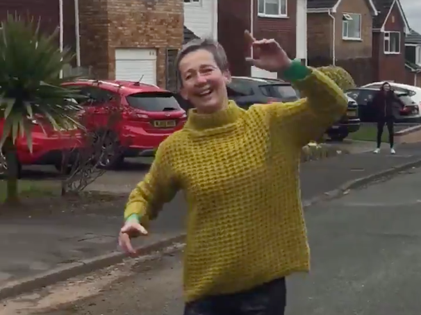Elsa Williams shares video on Twitter of street partaking in socially distant dancing
