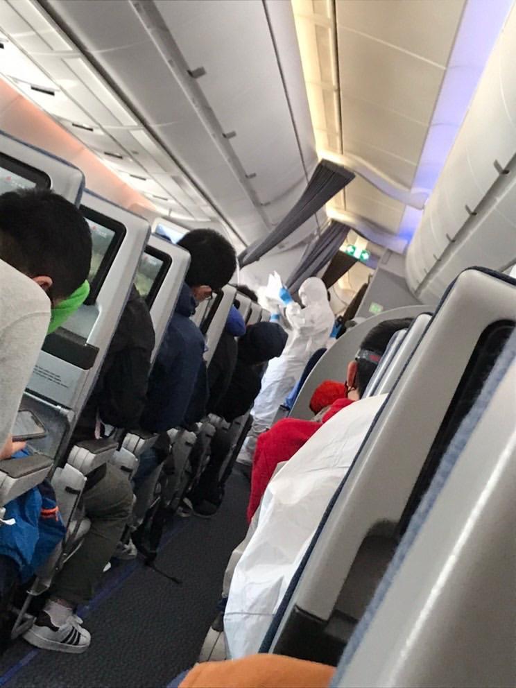 After landing in Shanghai, passengers from Italy and Iran were escorted off the plane to be tested