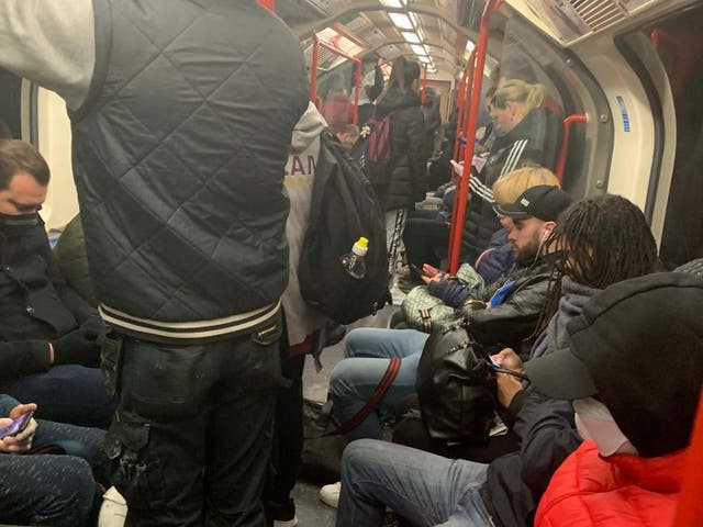 A crowded carriage on a London central line train the day after prime minister Boris Johnson put the UK in lockdown to help curb the spread of coronavirus.