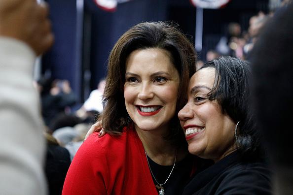 Gretchen Whitmer, left, has clashed with the president since the coronavirus pandemic hit the US