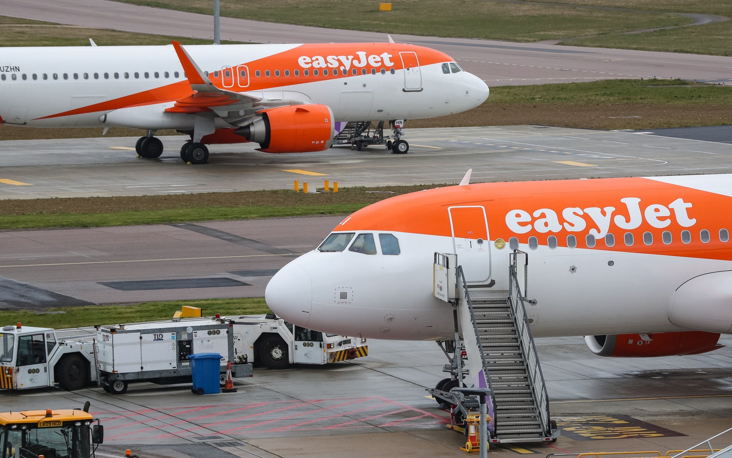 Going nowhere: easyJet planes sit on the tarmac at Luton airport this week