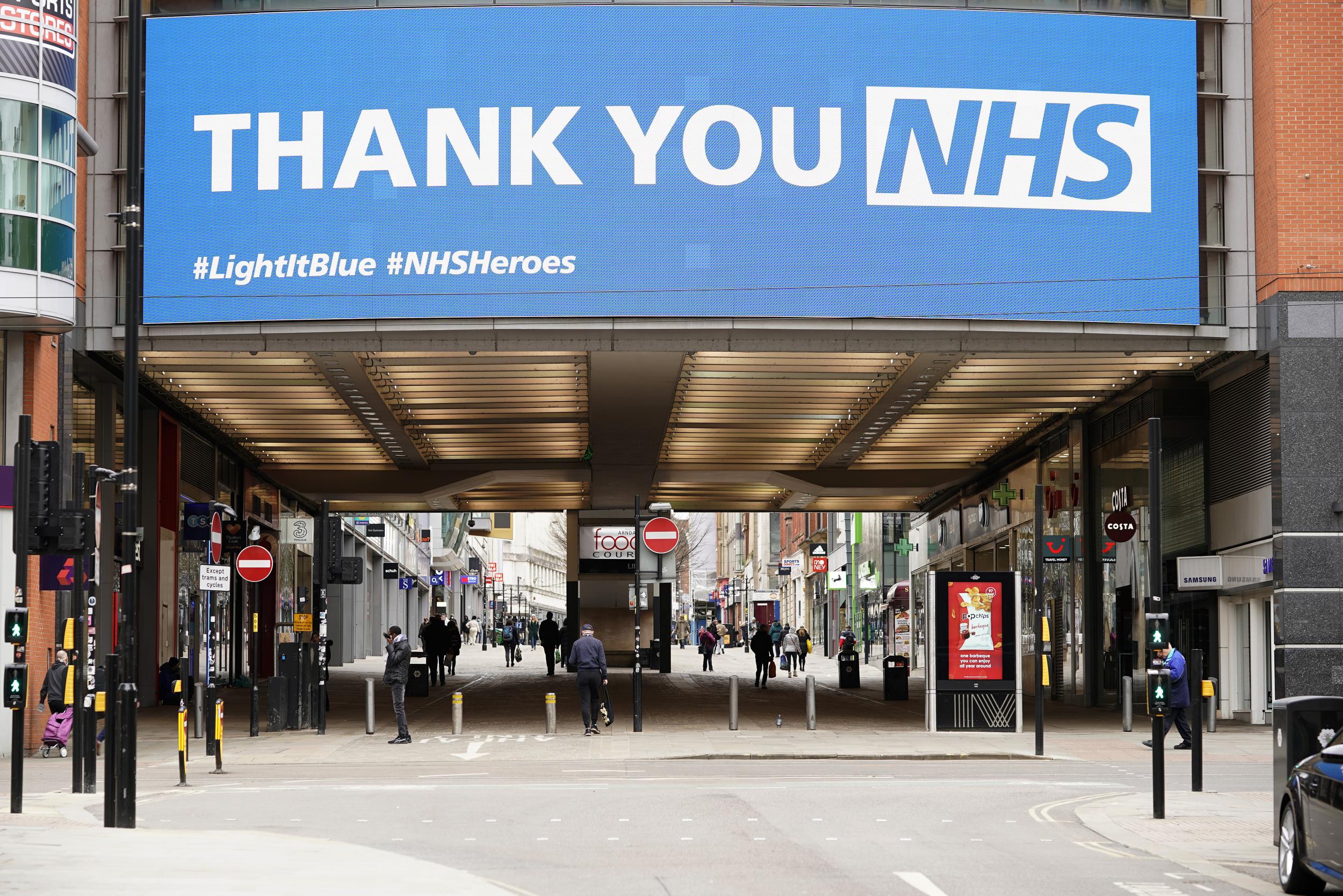 Clap for carers: UK unites to cheer and applaud NHS workers