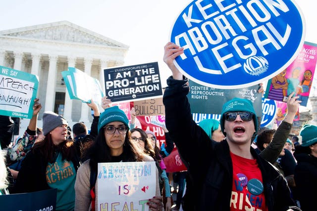 Pro-choice activists protest outside the Supreme Court in Washington DC