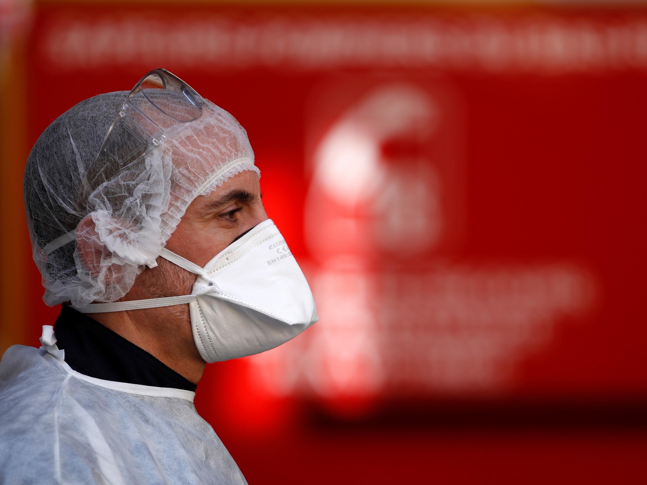 A member of an ambulance crew during a rescue operation in Strasbourg as the spread of the coronavirus disease (Covid-19) continues in France, 27 March, 2020