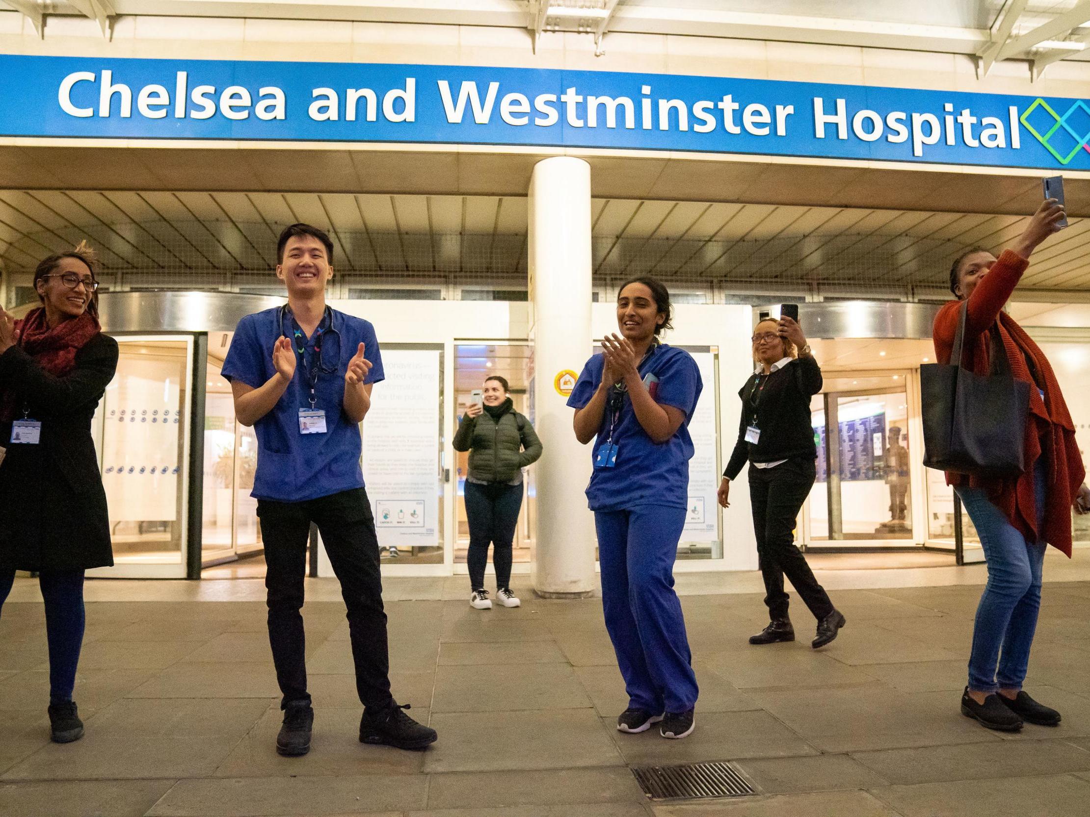 NHS workers outside the Chelsea and Westminster Hospital during the Clap for our Carers campaign