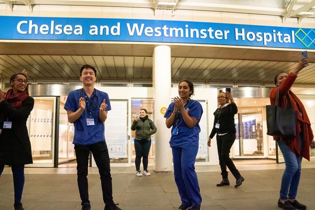 NHS workers outside the Chelsea and Westminster Hospital during the Clap for our Carers campaign