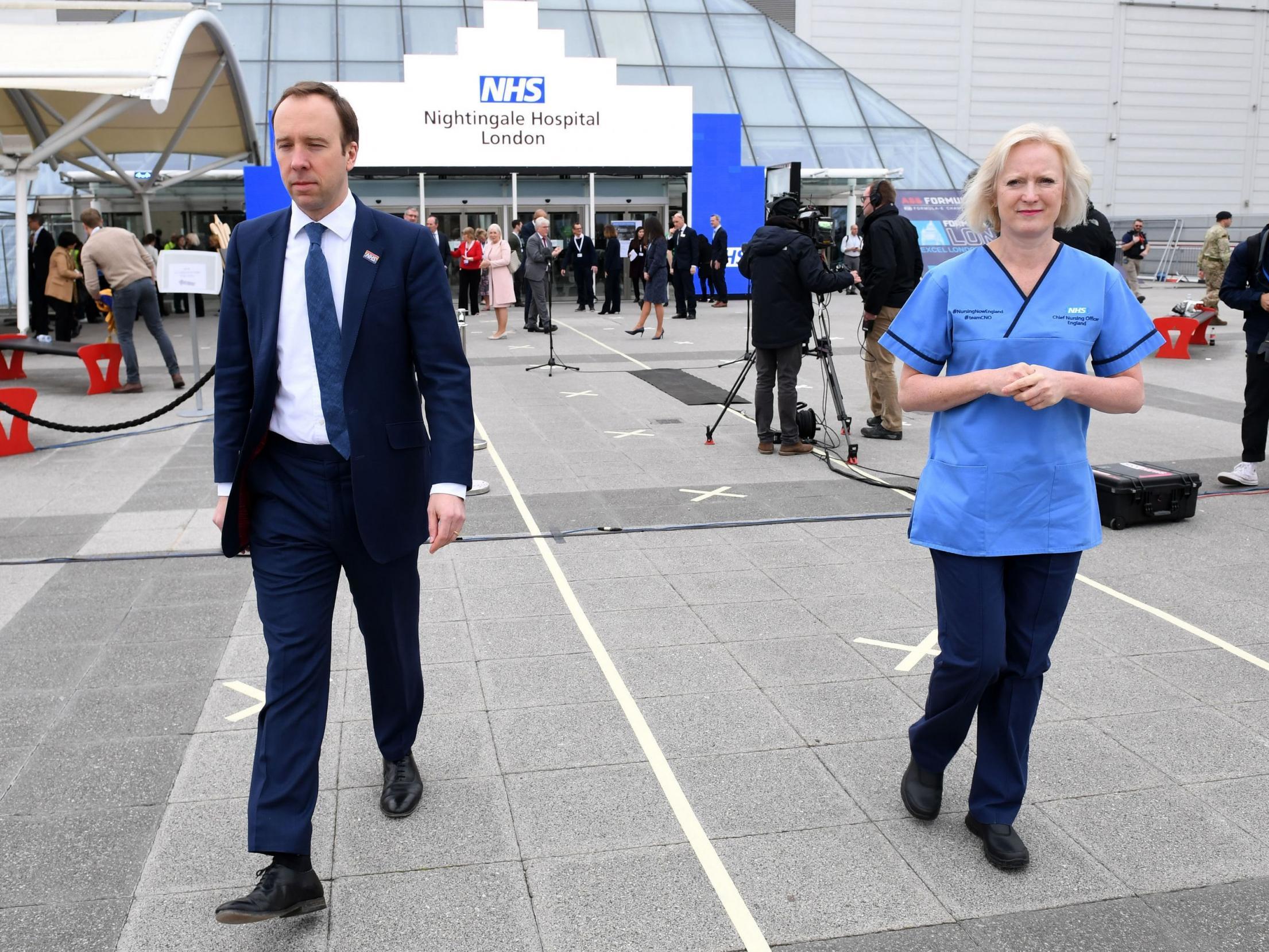 Matt Hancock and nursing chief Ruth May attend the opening of the Nightingale hospital (AFP )