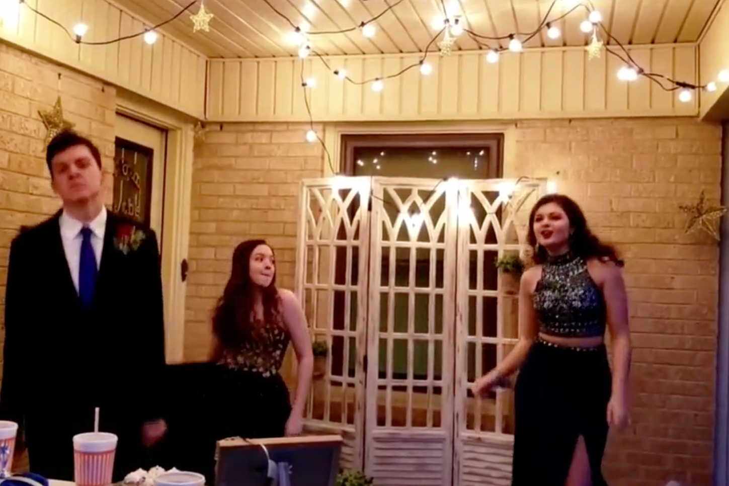 Family hosts 'porch prom' for high school senior after dance is cancelled because coronavirus (Jaci Chapman)
