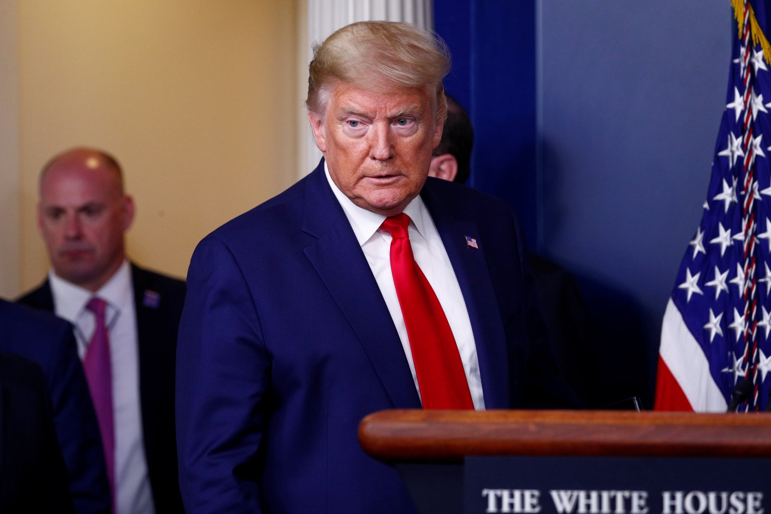 Donald Trump arrives for a White House briefing on the coronavirus pandemic