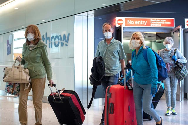 Passengers from the cruise ship Zaandam arrive at Heathrow Airport in London