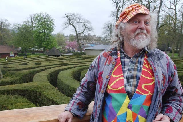 Lord Bath standing on the 10-metre tall wooden tower in the middle of the maze at the Longleat Estate in Wiltshire