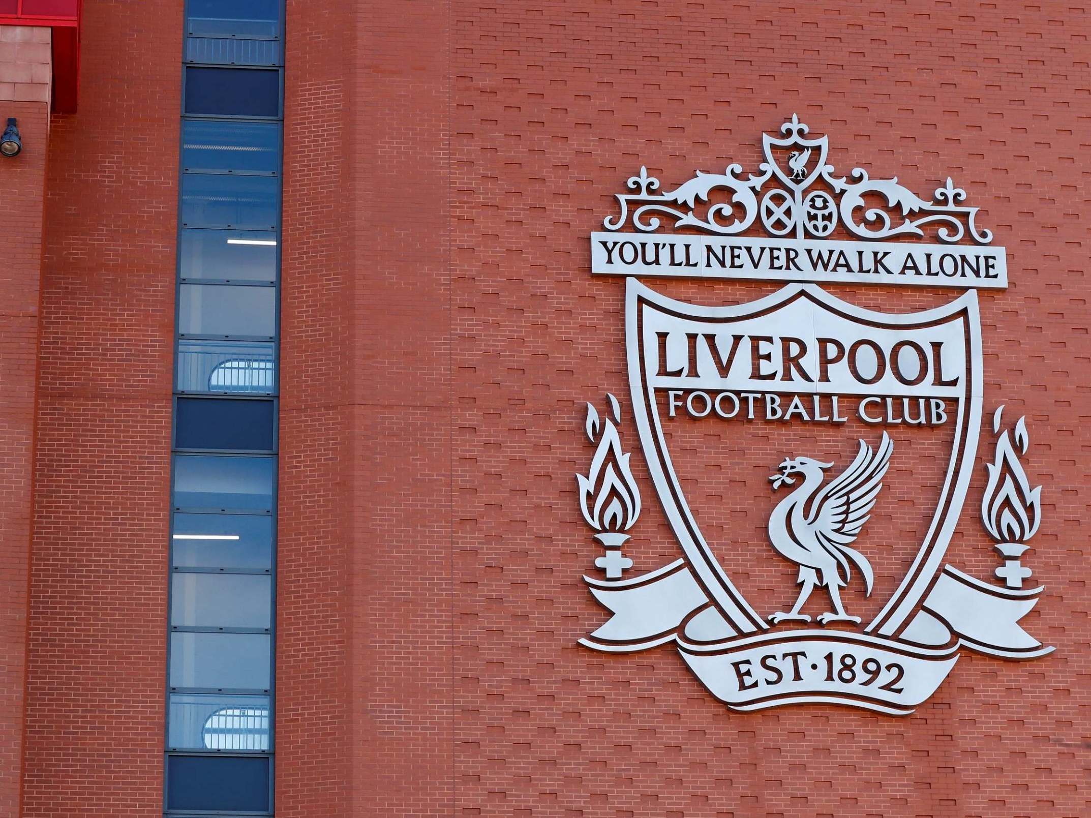 There is a growing anger among players Liverpool's plan to furlough staff
