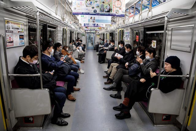 Commuters are still packed on public transport despite cities around the world following lockdown rules