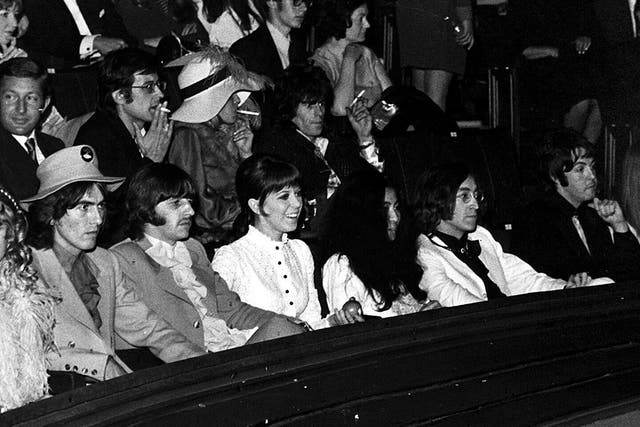 The writing on the wall: George Harrison, Ringo Starr and wife Maureen, Yoko Ono, John Lennon and Paul McCartney at the 1968 premiere of 'Yellow Submarine'