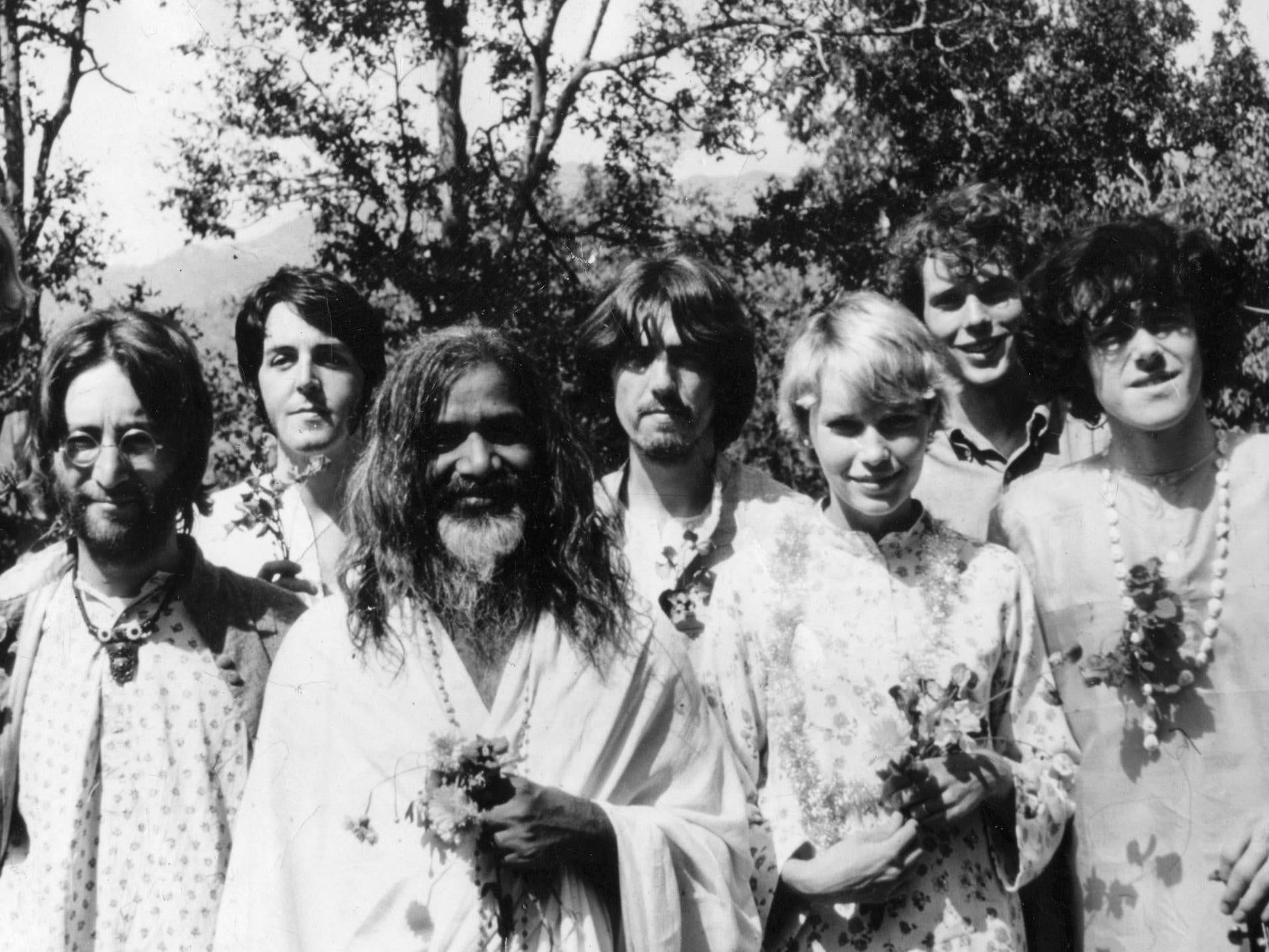 John Lennon, Paul McCartney, the Maharishi Mahesh Yogi, George Harrison, actor Mia Farrow and musician Donovan (far right) in Rishikesh, India, in 1968