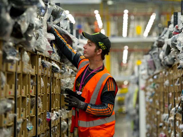 A worker at an Amazon fulfilment centre 