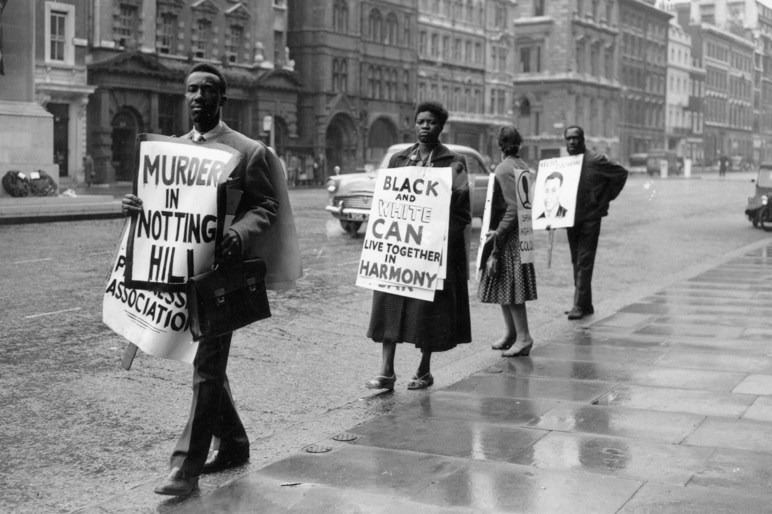 Protesters demonstrate in Whitehall against the outbreak of racist violence in London in 1959 (Getty)