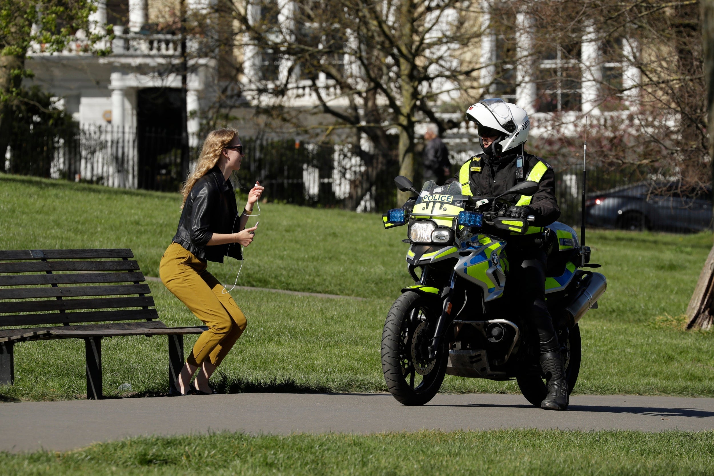 A woman sat on a bench in Primrose Hill is told to leave