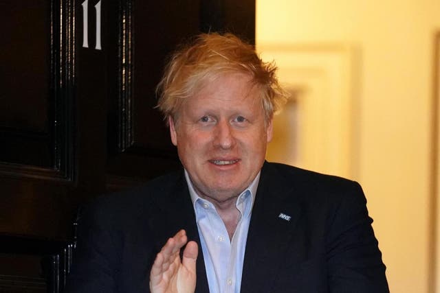 Boris Johnson applauds the NHS at Downing Street, shortly before his admission to hospital