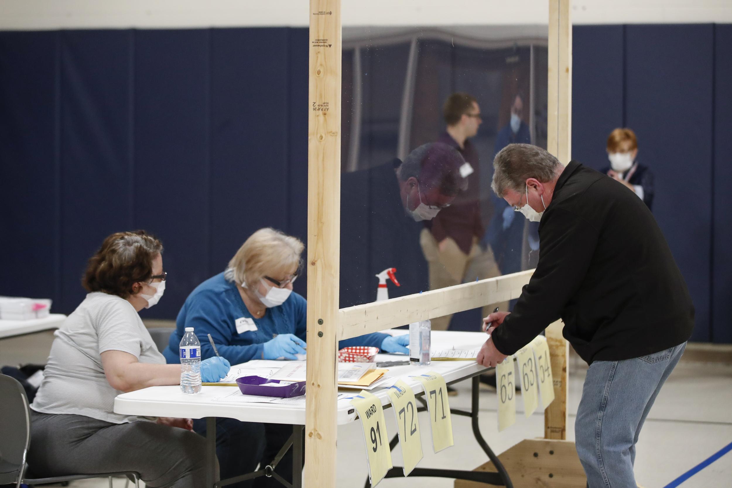 Crowds form at Wisconsin primary as Bernie Sanders warns 'dangerous