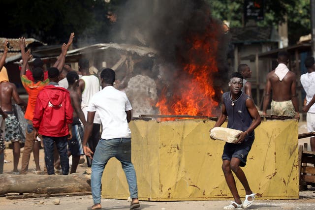 Residents protest after ransacking a half-built makeshift hospital for coronavirus in Ivory coast