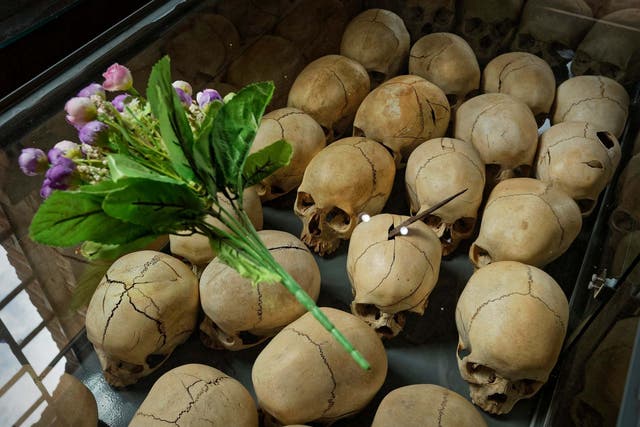 Flowers were laid on a glass case containing the skulls of some of those killed in the genocide at last year's memorial