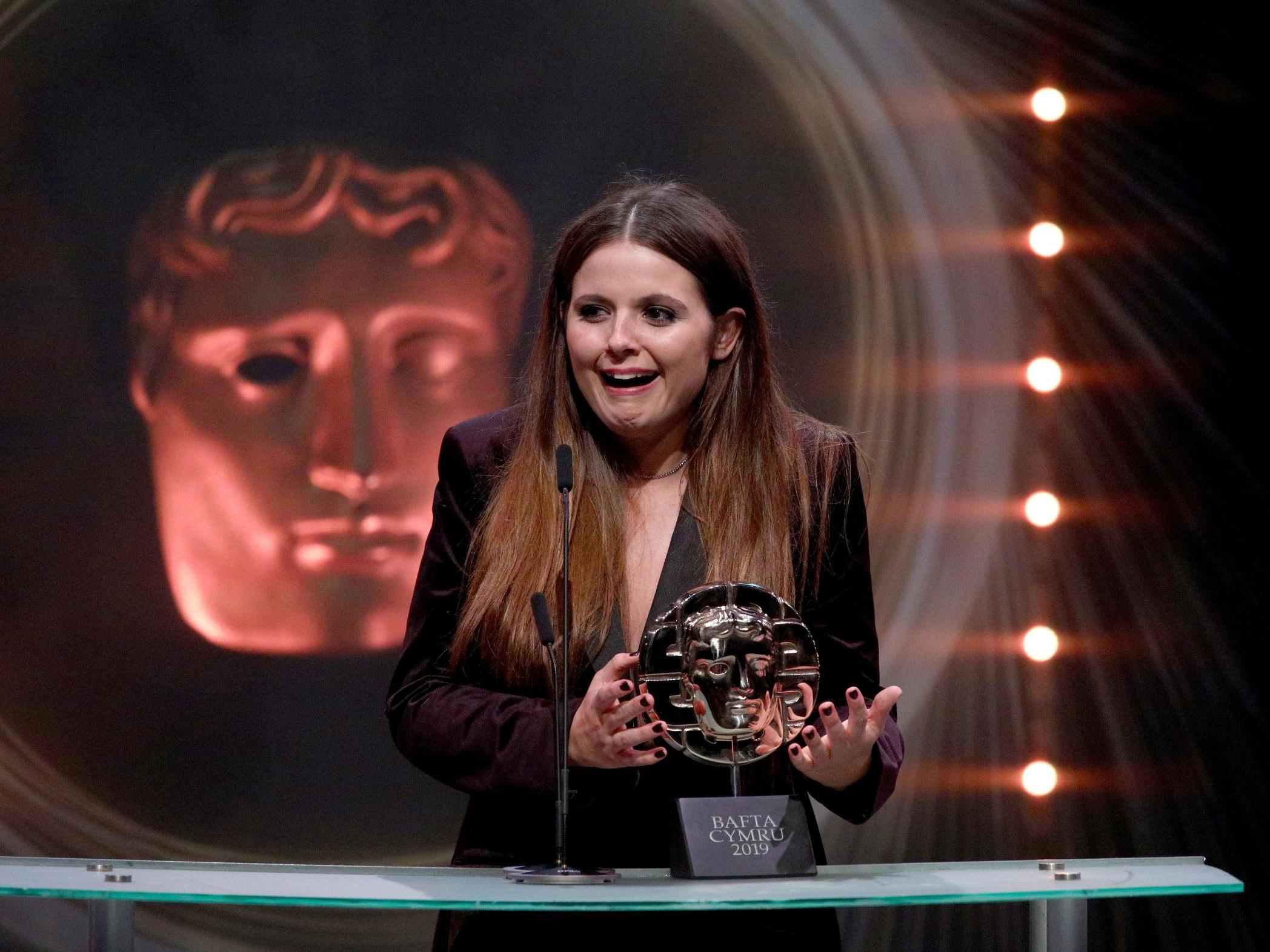Gabrielle Creevy accepts a Bafta Cymru for Best Actress.